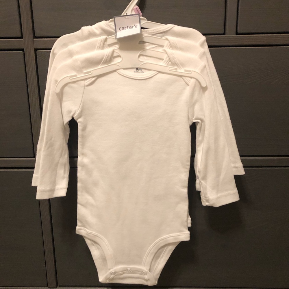 Carter’s white onesie 3 pack